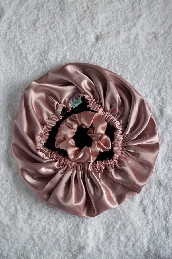 Crue hair net on a white background in rose color 